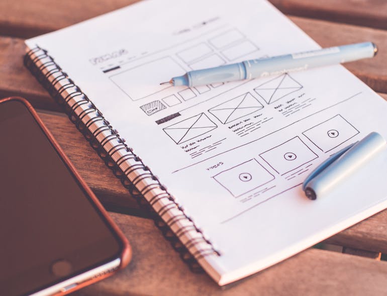 A notebook with ideas on how to make your website stand out visually